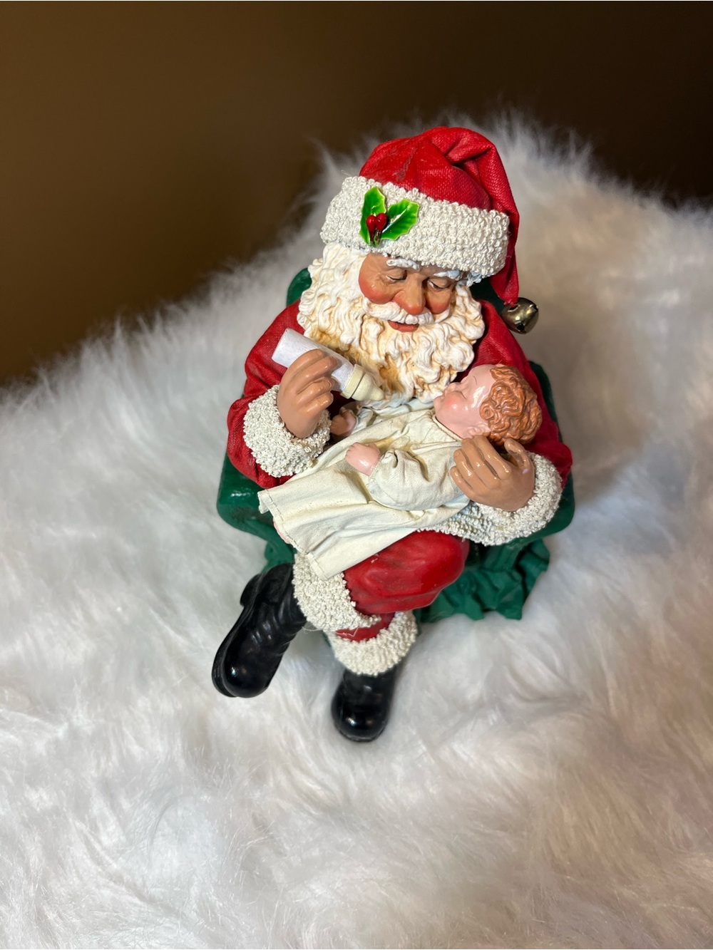 Possible Dreams Clothtique Musical Santa holding baby